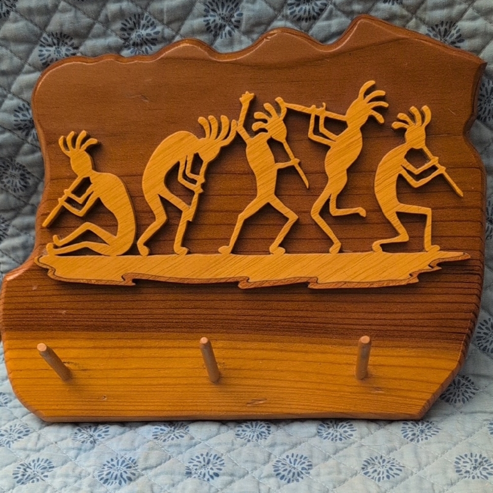 Artistic Brown Wall Hooks with Kokopelli Design